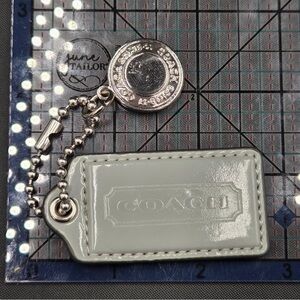 Coach Metallic Silver and Light Gray Keychain